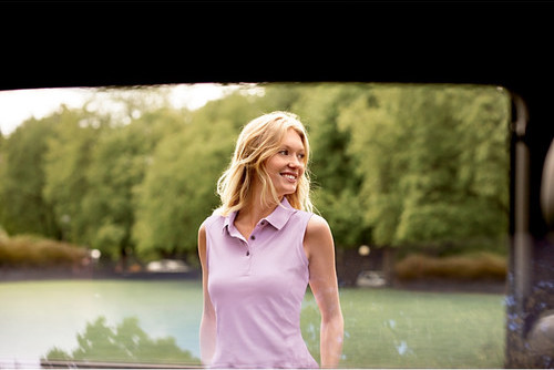 Woman in sleeveless Cutter & Buck polo