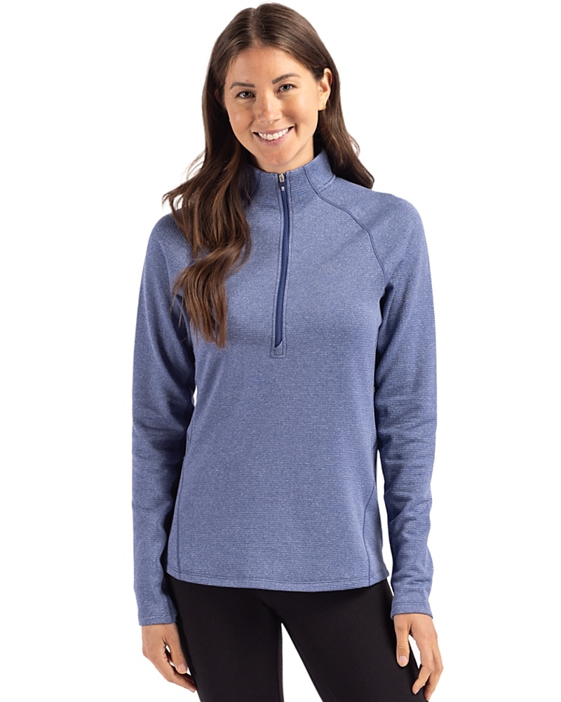 Woman wearing Cutter & Buck Peshastin Eco Fleece Recycled 91վs Half Zip Pullover in Tour Blue Heather