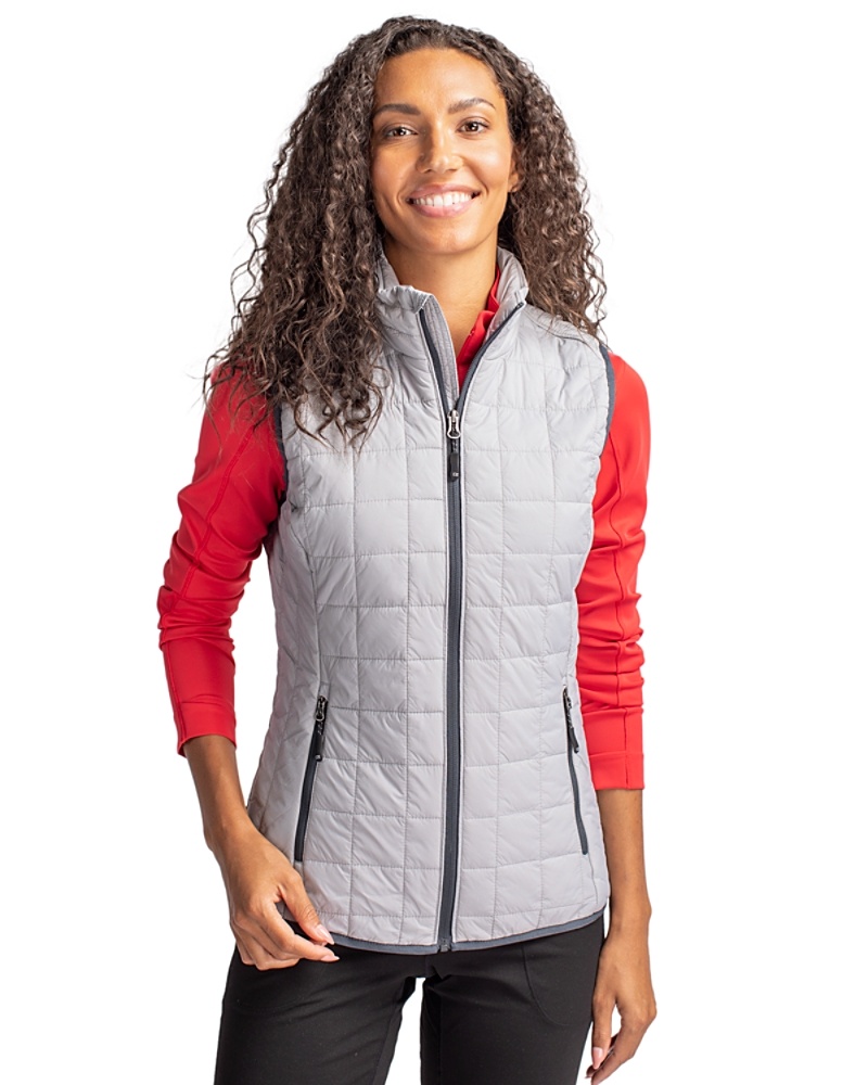 Woman wearing Cutter & Buck Rainier PrimaLoft® 91վs Eco Insulated Full Zip Puffer Vest in Polished or Grey
