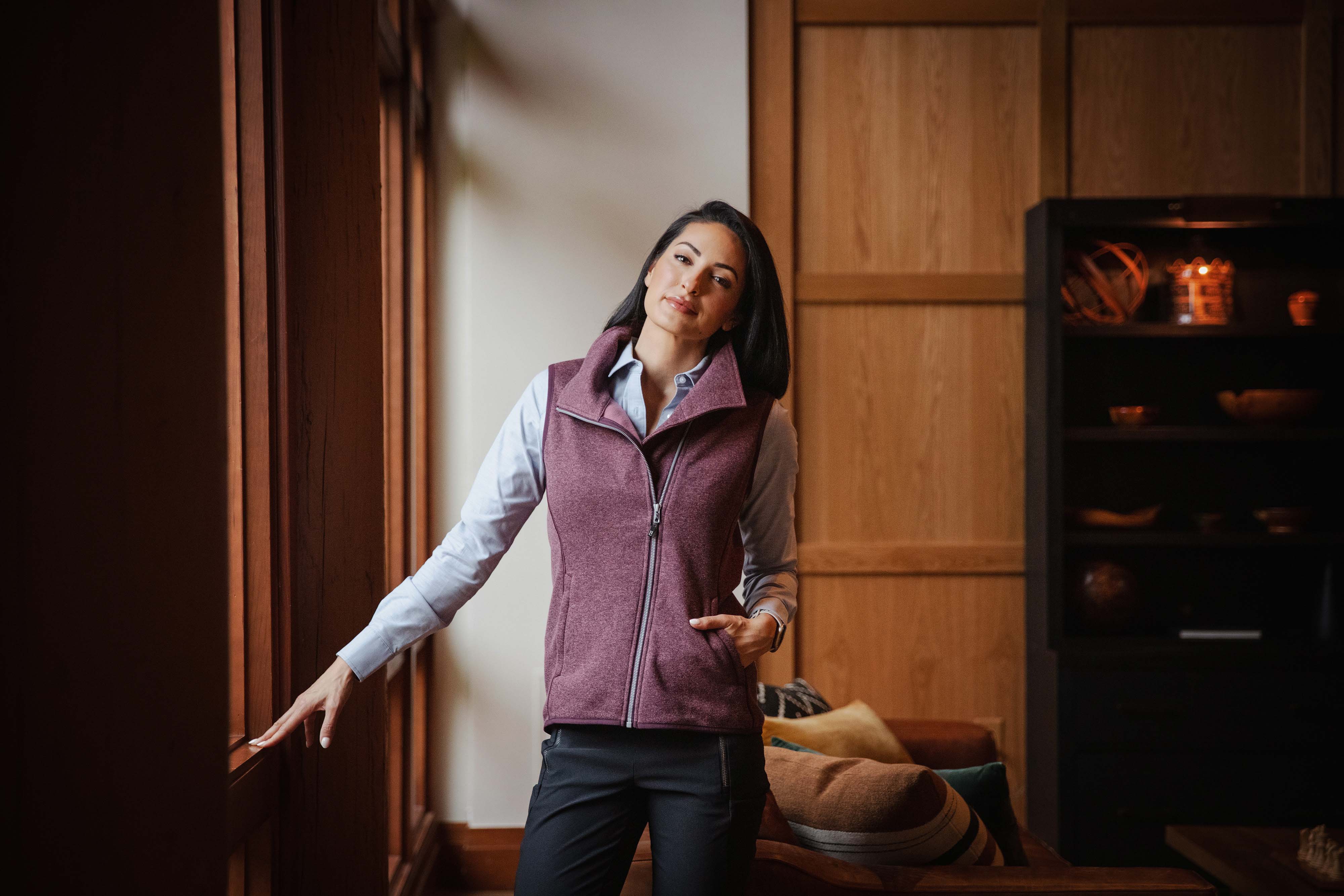 Woman in an office wearing Cutter & Buck Mainsail Sweater-Knit Womens Full Zip Vest