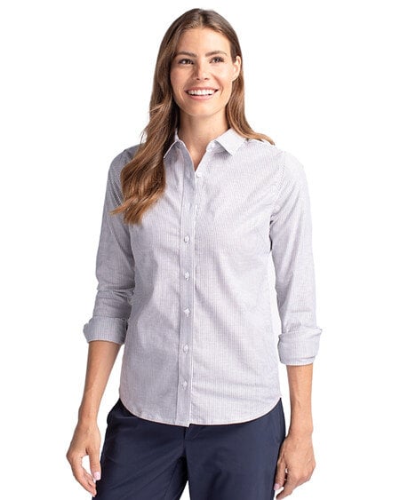 Woman weaing Cutter & Buck Stretch Oxford Stripe Womens Long Sleeve Dress Shirt in light blue