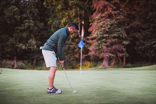 Man in Cutter & Buck Bainbridge short