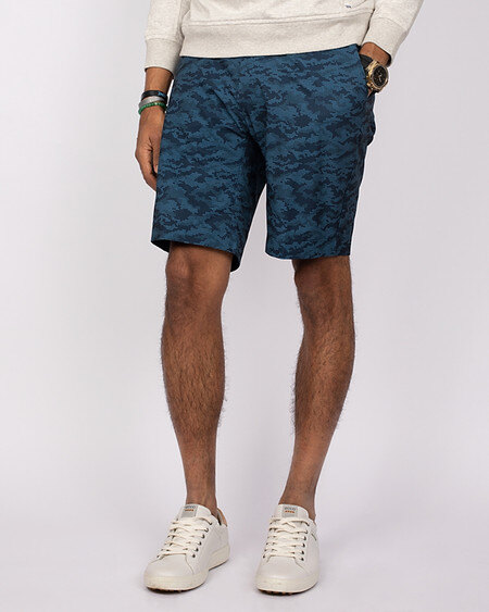 Man wearing Cutter & Buck Big & Tall Bainbridge Sport Short Camo Print in Navy Camo