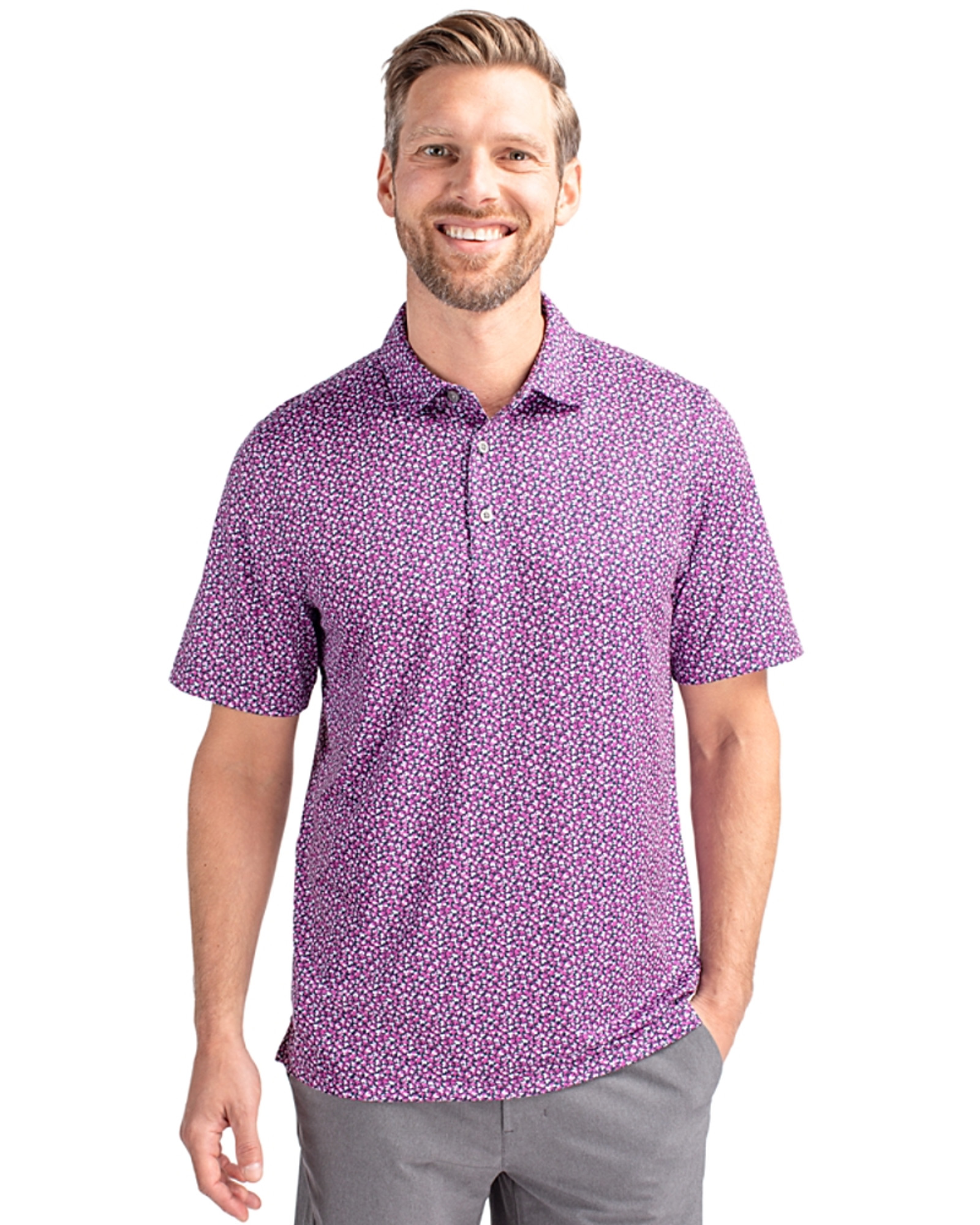 Man wearing a Gelato/Navy Blue Cutter & Buck Pike Magnolia Print Stretch Mens Polo during summer