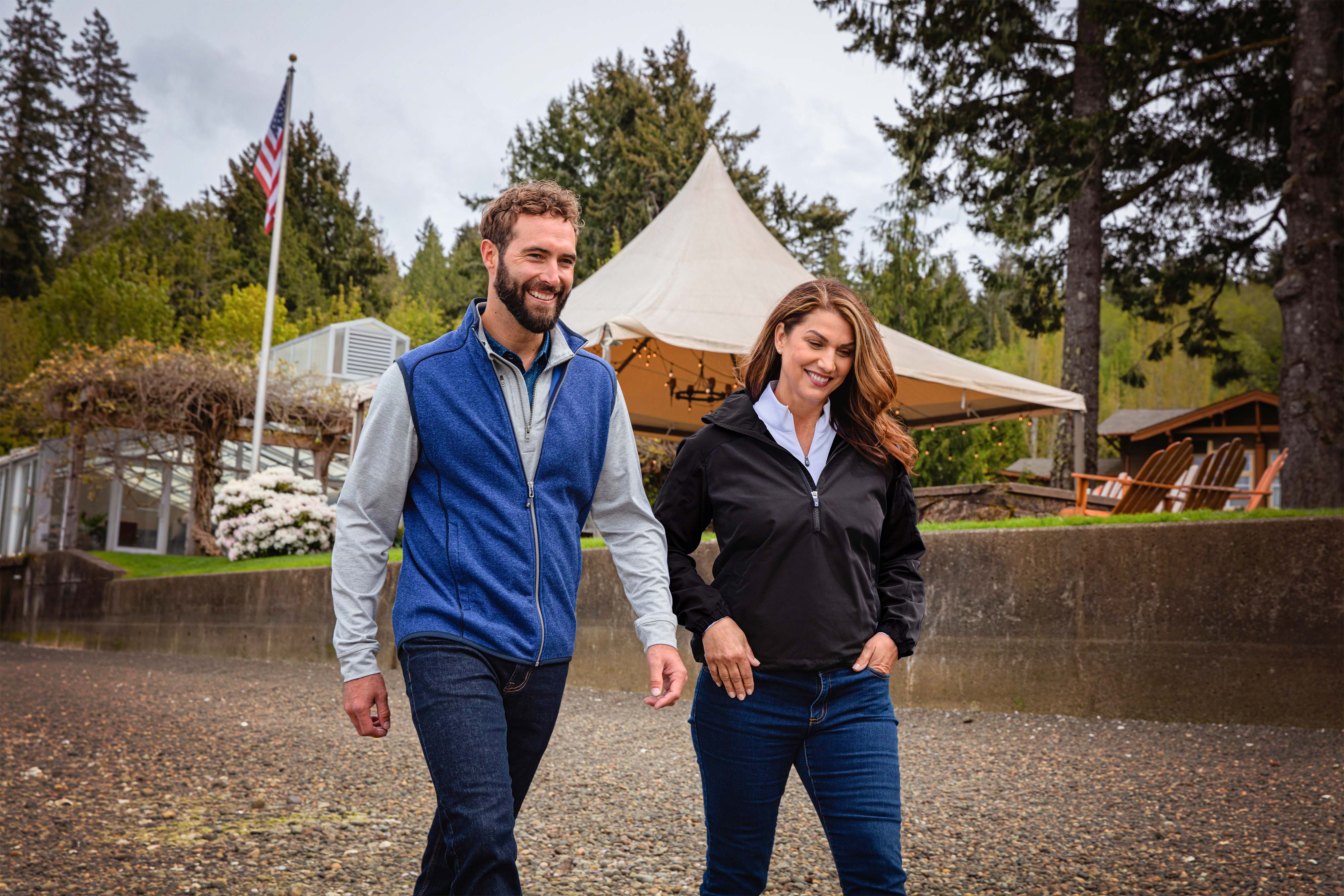 Man walking with woman wearing Cutter & Buck Mainsail Sweater-Knit Mens Full Zip Vest