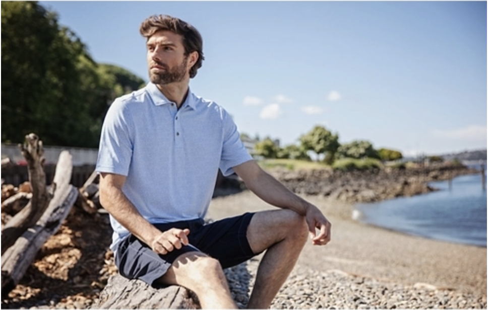 Man on the Beach Wearing Cutter & Buck Virtue Eco Pique Botanical Print Recycled Polo