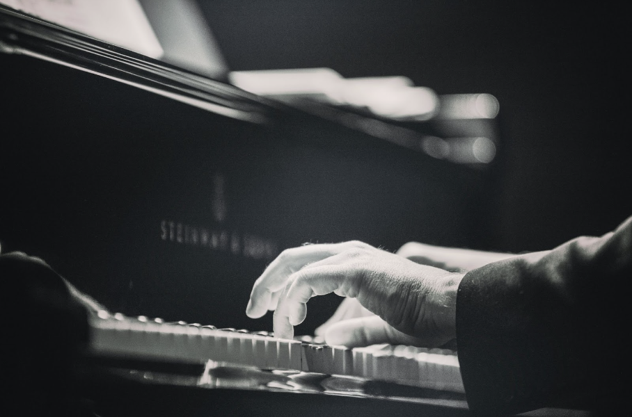 Elton John playing piano