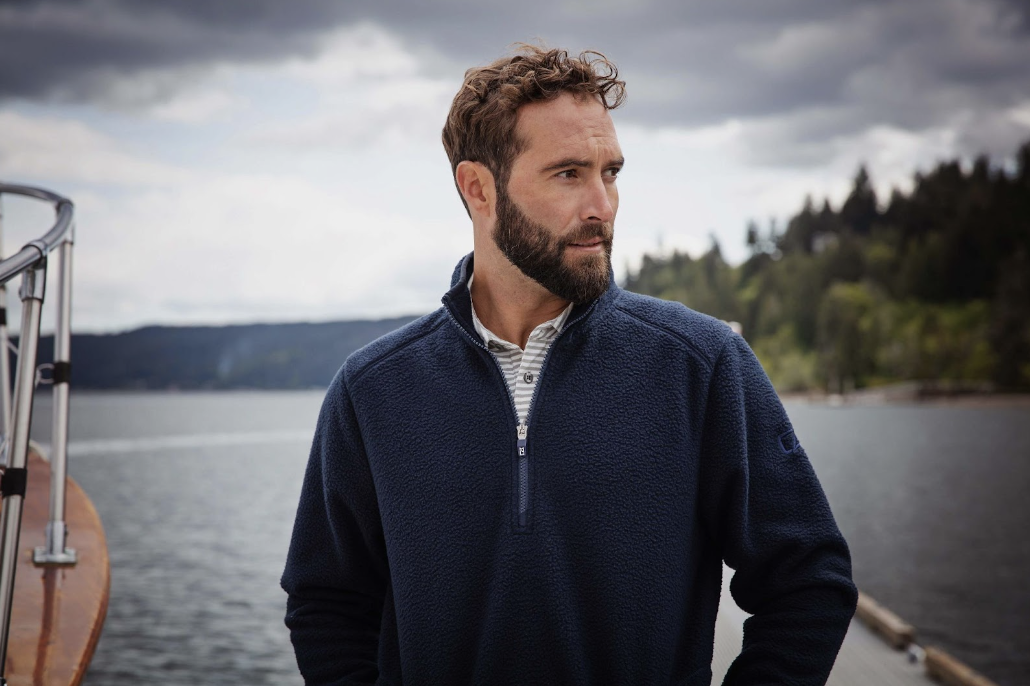 Man on boat wearing Cutter & Buck Cascade Eco Sherpa Fleece Mens Quarter Zip Jacket