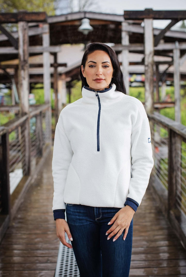 woman outside wearing sherpa pullover