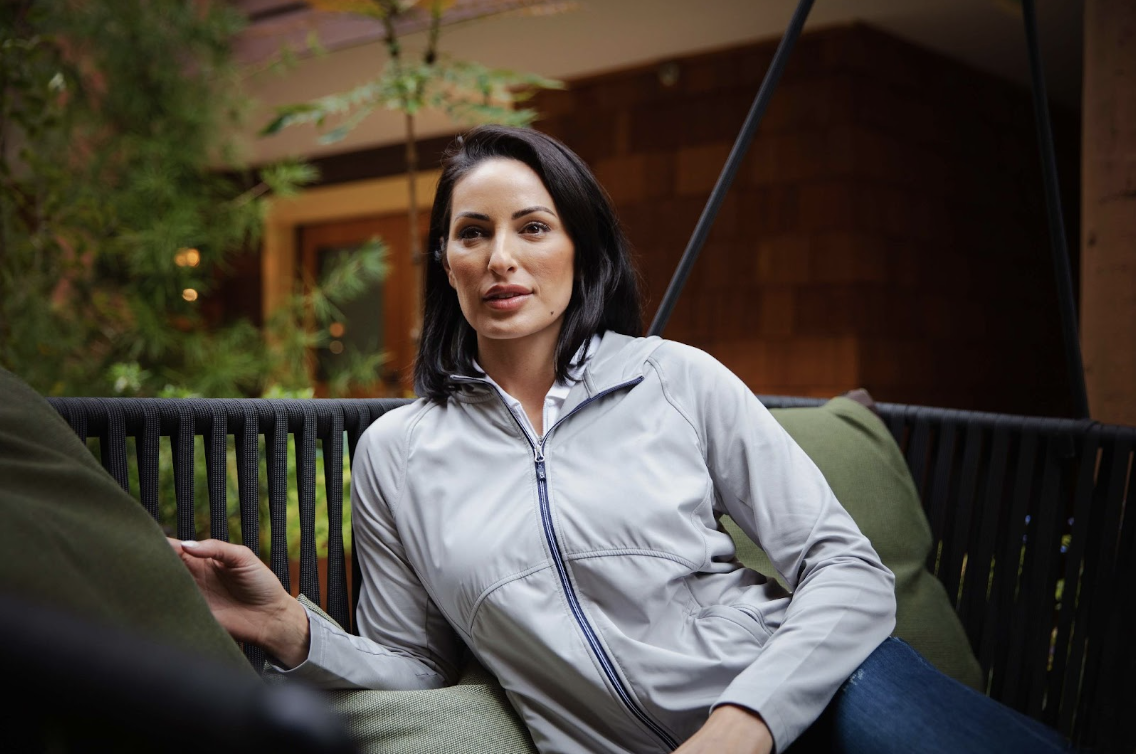 woman outside wearing lightweight jacket