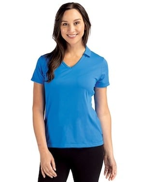 Sporty woman wearing a digital blue Daybreak Eco Recycled Womens V-neck Polo