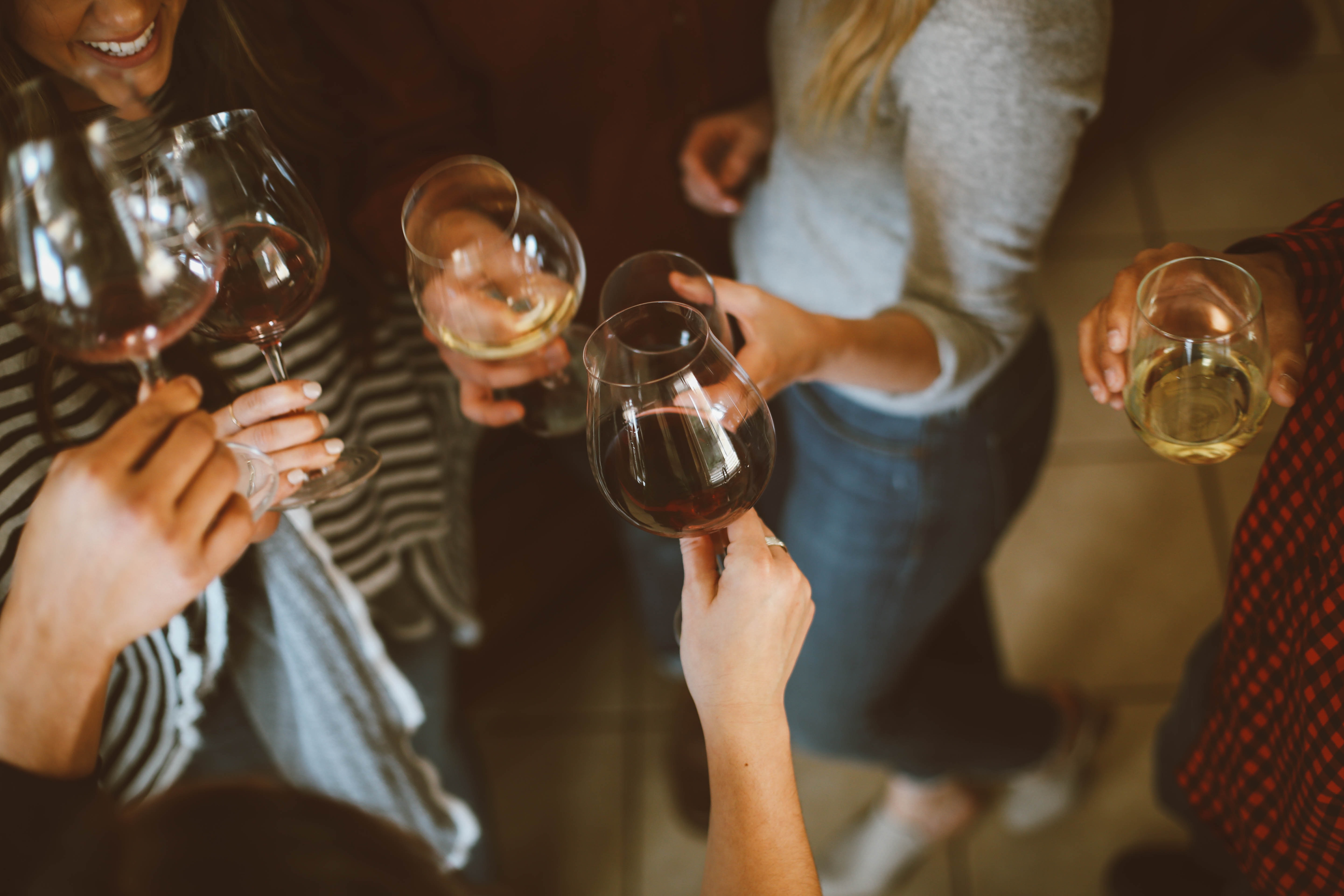 friends cheersing to their end of summer night out