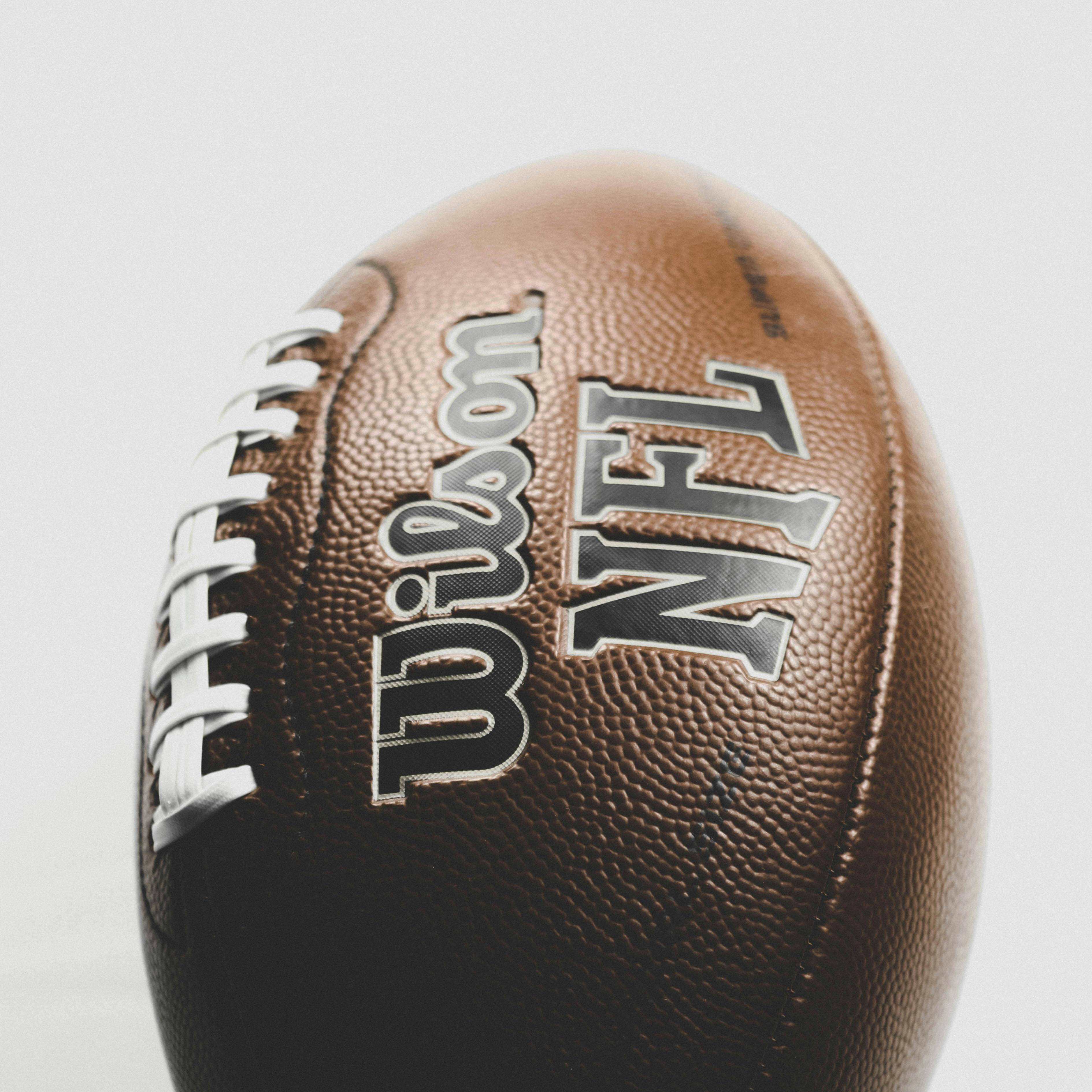 A close shot of a Wilson NFL football