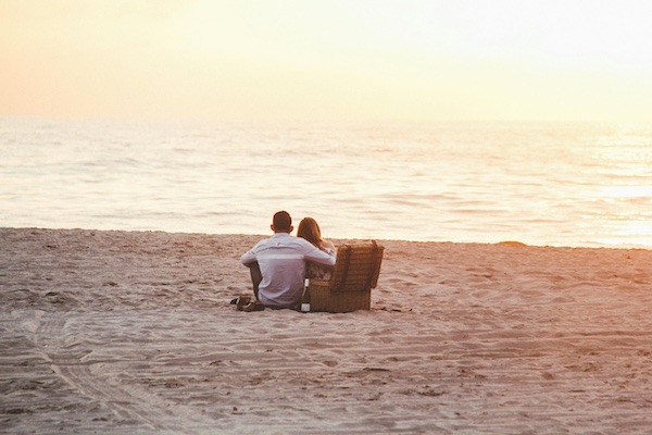 Waste free beach picnic at sunset